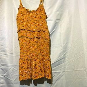 Form fitting floral dress with ruffles